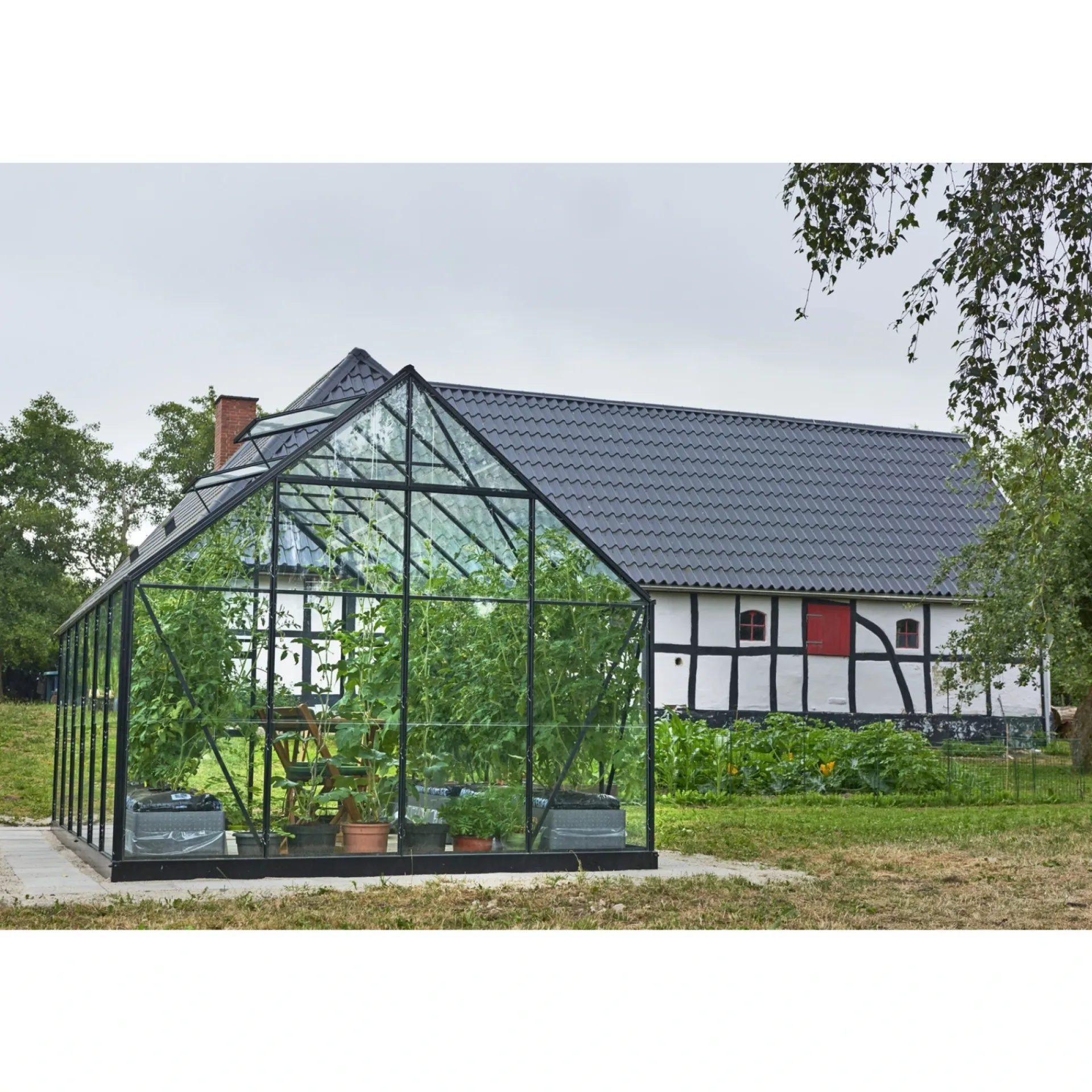 Outrium Drivhuse > DRIVHUS INKL. SOKKEL 3 MM DELT GLAS SORT 9,9 M2